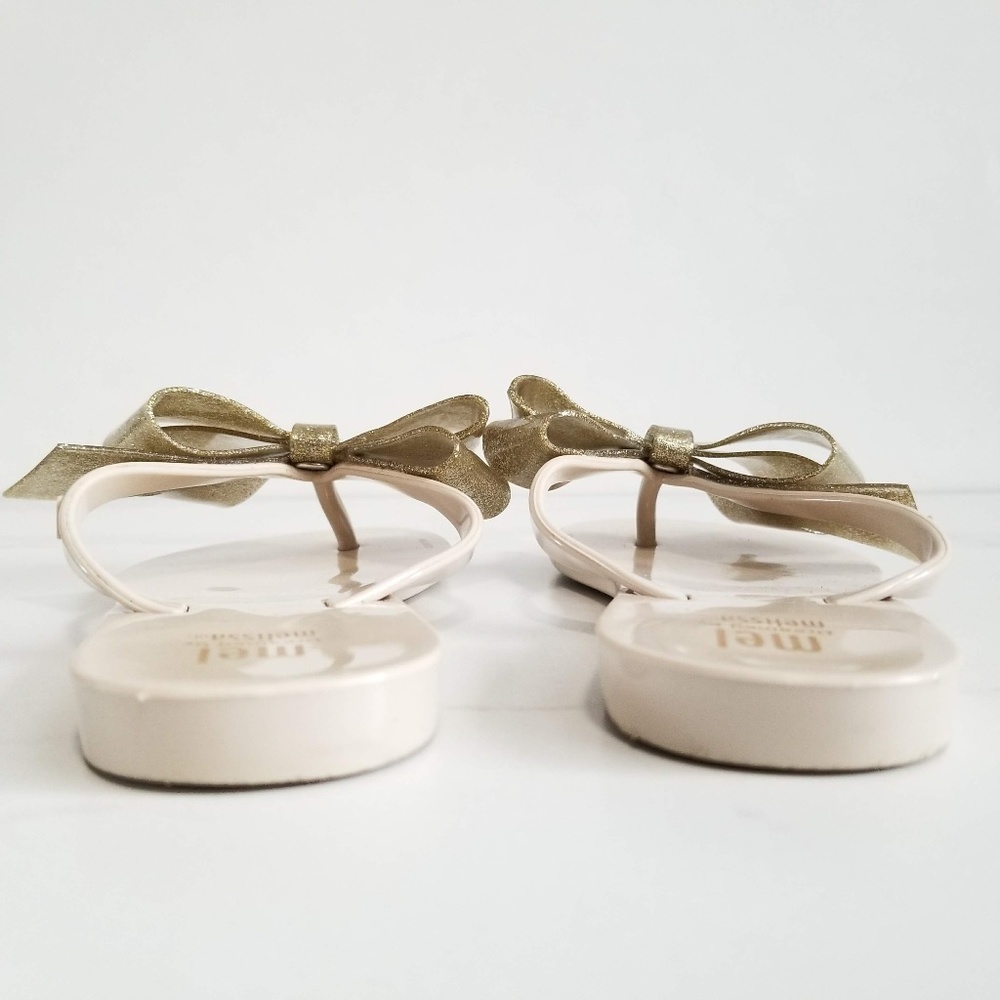 MEL by MELISSA Harmonic Gold Bow III Flip Flops - Picture 9 of 11